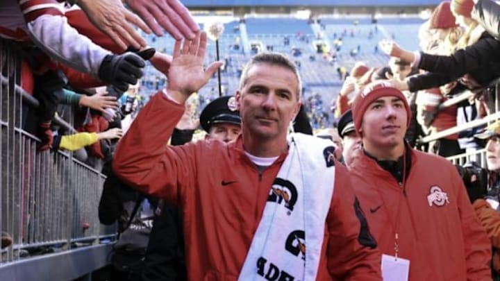 Nov 28, 2015; Ann Arbor, MI, USA; Ohio State Buckeyes head coach Urban Meyer walks off the field after the game against the Michigan Wolverines at Michigan Stadium. Ohio State won 42-13. Mandatory Credit: Tim Fuller-USA TODAY Sports