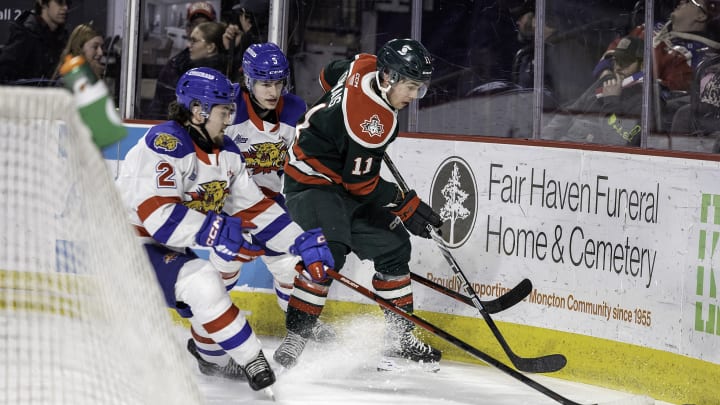 MONCTON, NB – MARCH 12:Anthony Hamel #2 and Etienne Morin #5 of Moncton Wildcats defend against Jordan Dumais #11 of Halifax Mooseheads during first period at Avenir Centre on March 12, 2023 in Moncton, Canada. (Photo by Dale Preston/Getty Images)