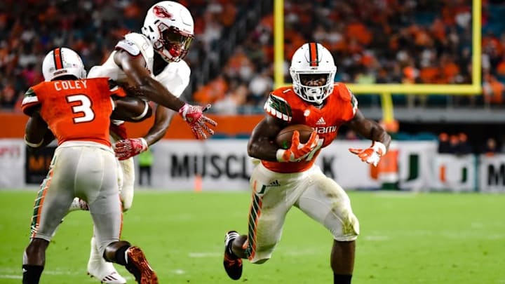 Sep 10, 2016; Miami Gardens, FL, USA; Miami Hurricanes running back Mark Walton (1) carries the ball during the second half against Florida Atlantic Owls at Hard Rock Stadium. Miami won 38-10. Mandatory Credit: Steve Mitchell-USA TODAY Sports