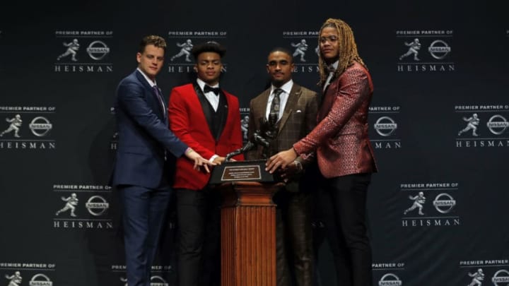 NEW YORK, NY - DECEMBER 14: (L-R) Finalists for the 85th annual Heisman Memorial Trophy, quarterback Joe Burrow of the LSU Tigers, quarterback Justin Fields of the Ohio State Buckeyes, quarterback Jalen Hurts of the Oklahoma Sooners and defensive end Chase Young of the Ohio State Buckeyes pose for a picture on December 14, 2019 in New York City. (Photo by Adam Hunger/Getty Images)