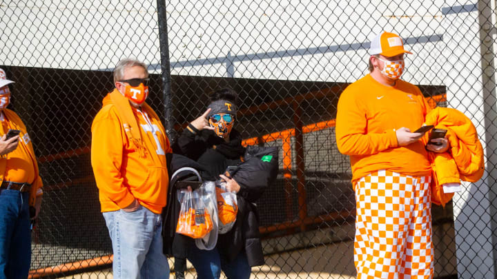 Tennessee fans wait in line to enter Neyland Stadium before the Tennessee and Florida college football game at the University of Tennessee in Knoxville, Tenn., on Saturday, Dec. 5, 2020.Pregame Tennessee Vs Florida 2020 111447