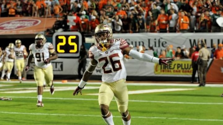 Nov 15, 2014; Miami Gardens, FL, USA; Florida State Seminoles defensive back P.J. Williams (26) takes the field prior to a game against Miami Hurricanes at Sun Life Stadium. Mandatory Credit: Steve Mitchell-USA TODAY Sports