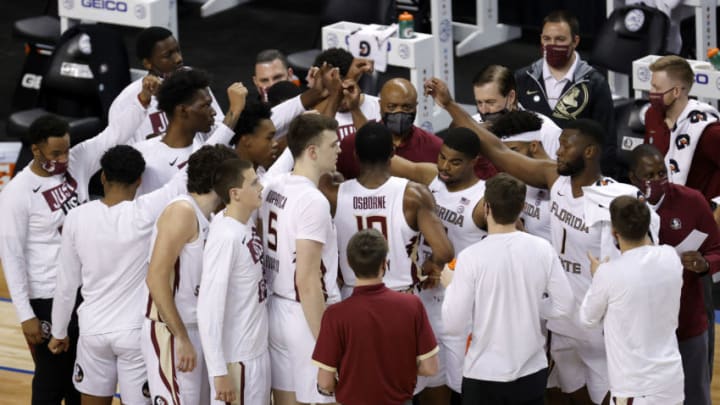 GREENSBORO, NORTH CAROLINA - MARCH 13: The Florida State Seminoles huddle under a timeout during the second half of the ACC Men's Basketball Tournament championship game against the Georgia Tech Yellow Jackets at Greensboro Coliseum on March 13, 2021 in Greensboro, North Carolina. (Photo by Jared C. Tilton/Getty Images)