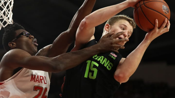 COLLEGE PARK, MARYLAND – FEBRUARY 29: Thomas Kithier #15 of the Michigan State Spartans pulls in a rebound in front of Jalen Smith #25 of the Maryland Terrapins during the second half at Xfinity Center on February 29, 2020 in College Park, Maryland. (Photo by Patrick Smith/Getty Images)