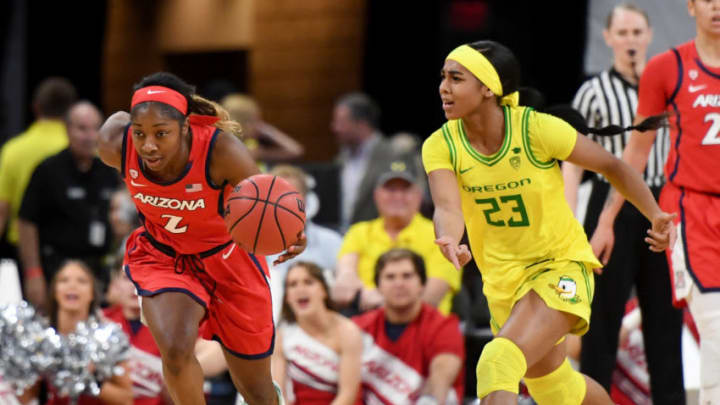 LAS VEGAS, NEVADA - MARCH 07: Aarion McDonald #2 of the Arizona Wildcats tries to start a fast break against Minyon Moore #23 of the Oregon Ducks during the Pac-12 Conference women’s basketball tournament semifinals at the Mandalay Bay Events Center on March 7, 2020 in Las Vegas, Nevada. Oregon got the ball back because of a kick ball call. The Ducks defeated the Wildcats 88-70. (Photo by Ethan Miller/Getty Images)