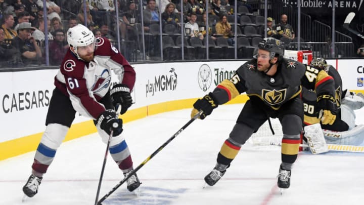 LAS VEGAS, NEVADA - SEPTEMBER 25: Martin Kaut #61 of the Colorado Avalanche passes against Jake Bischoff #45 of the Vegas Golden Knights in the third period of their preseason game at T-Mobile Arena on September 25, 2019 in Las Vegas, Nevada. The Avalanche defeated the Golden Knights 4-1. (Photo by Ethan Miller/Getty Images)