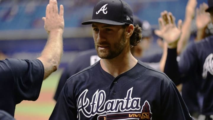 ST PETERSBURG, FL - MAY 8: Charlie Culberson #16 of the Atlanta Braves celebrates with teammates after a 1-0 win over the Tampa Bay Rays on May 8, 2018 at Tropicana Field in St Petersburg, Florida. (Photo by Julio Aguilar/Getty Images)