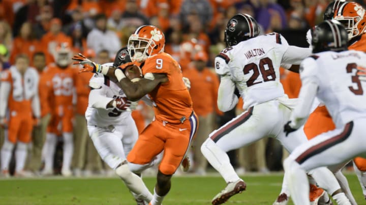 CLEMSON, SC - NOVEMBER 26: Clemson running back Wayne Gallman (9) breaks a tackle during 1st half action between the Clemson Tigers and the South Carolina Gamecocks at Memorial Stadium in Clemson, SC. on November 26, 2016. (Photo by Doug Buffington/Icon Sportswire via Getty Images)
