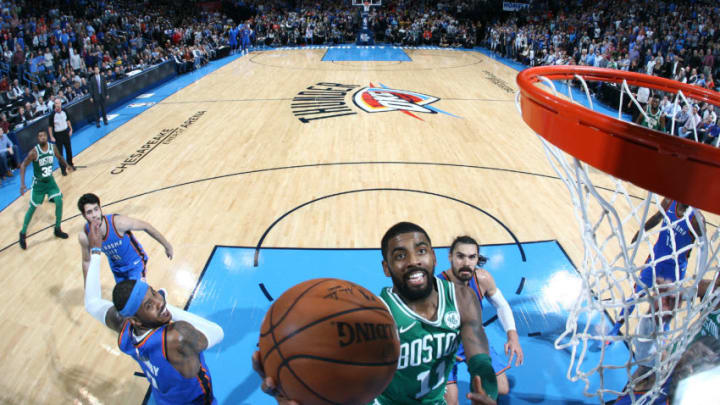 OKLAHOMA CITY, OK - NOVEMBER 3: Kyrie Irving #11 of the Boston Celtics goes to the basket against the Oklahoma City Thunder on November 3, 2017 at Chesapeake Energy Arena in Oklahoma City, Oklahoma. NOTE TO USER: User expressly acknowledges and agrees that, by downloading and or using this photograph, User is consenting to the terms and conditions of the Getty Images License Agreement. Mandatory Copyright Notice: Copyright 2017 NBAE (Photo by Layne Murdoch/NBAE via Getty Images)