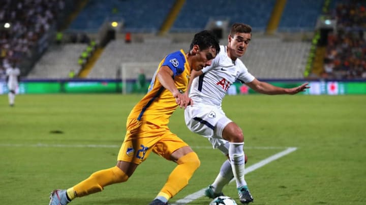 NICOSIA, CYPRUS - SEPTEMBER 26: Praxitelis Vouros of of Apoel FC and Harry Winks of Tottenham Hotspur battle for possession during the UEFA Champions League Group H match between Apoel Nicosia and Tottenham Hotspur at GSP Stadium on September 26, 2017 in Nicosia, Cyprus. (Photo by Clive Rose/Getty Images)