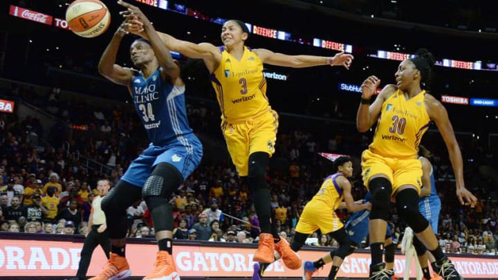 LOS ANGELES, CA - OCTOBER 1: Candace Parker #3 of the Los Angeles Sparks battles for the ball with Sylvia Fowles #34 of the Minnesota Lynx while teammate Nneka Ogwumike #30 of the Los Angeles Sparks during the second half of Game Four of WNBA Finals at Staples Center October 1, 2017, in Los Angeles, California. NOTE TO USER: User expressly acknowledges and agrees that, by downloading and/or using this photograph, user is consenting to the terms and conditions of the Getty Images License Agreement. (Photo by Kevork Djansezian/Getty Images)