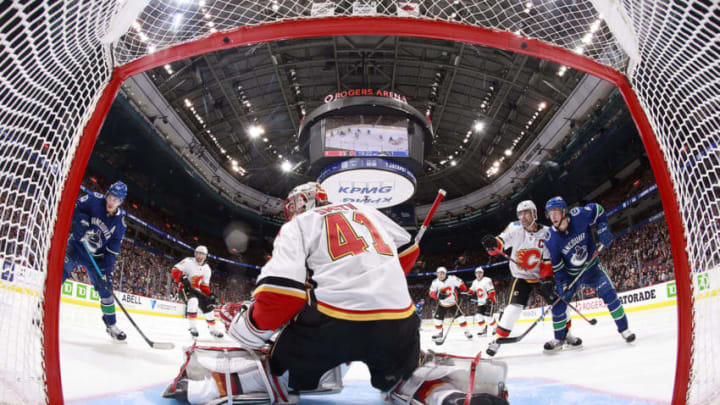 VANCOUVER, BC - OCTOBER 3: Mike Smith #41 of the Calgary Flames looks on from his crease during their NHL game against the Vancouver Canucks at Rogers Arena October 3, 2018 in Vancouver, British Columbia, Canada. (Photo by Jeff Vinnick/NHLI via Getty Images)"n