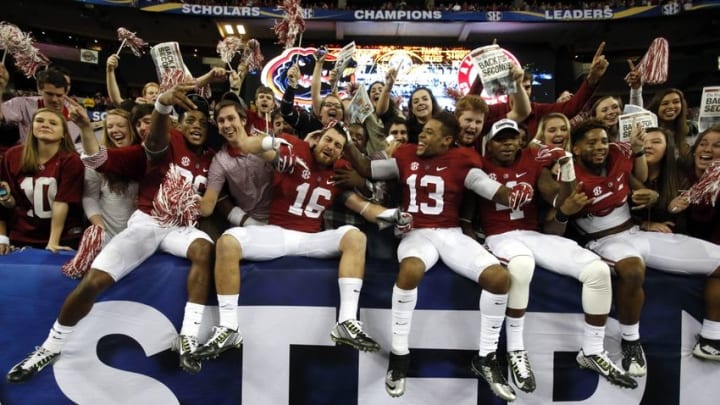 Dec 5, 2015; Atlanta, GA, USA; Alabama Crimson Tide wide receiver Richard Mullaney (16) celebrates with teammates and fans after defeating the Florida Gators in the 2015 SEC Championship Game at the Georgia Dome. Alabama won 29-15. Mandatory Credit: Jason Getz-USA TODAY Sports