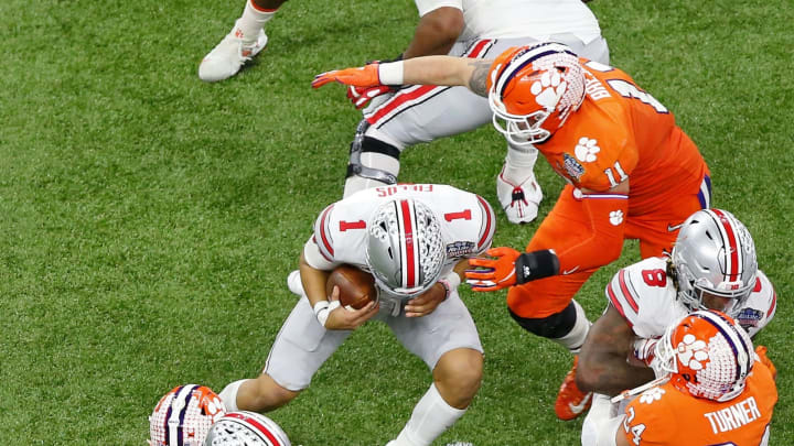 Jan 1, 2021; New Orleans, LA, USA; Clemson Tigers defensive lineman Bryan Bresee (11) sacks Ohio State Buckeyes quarterback Justin Fields (1) during the third quarter at Mercedes-Benz Superdome. Mandatory Credit: Russell Costanza-USA TODAY Sports