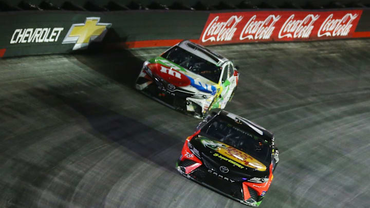 BRISTOL, TN – AUGUST 18: Martin Truex Jr., driver of the #78 Bass Pro Shops/Ducks Unlimited Toyota, leads Kyle Busch, driver of the #18 M and M’s White Chocolate Toyota (Photo by Sarah Crabill/Getty Images)