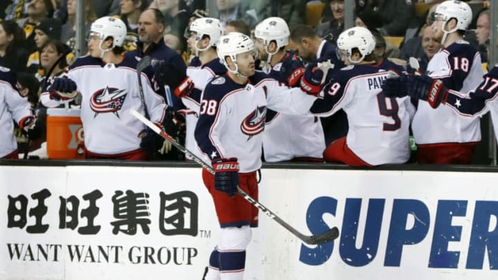 BOSTON, MA - MARCH 19: Columbus Blue Jackets Left Wing Boone Jenner (38) skates by the bench after scoring the first goal of the contest during a game between the Boston Bruins and the Columbus Blue Jackets on March 19, 2018, at TD Garden in Boston, Massachusetts. The Blue Jackets defeated the Bruins 5-4 (OT). (Photo by Fred Kfoury III/Icon Sportswire via Getty Images)
