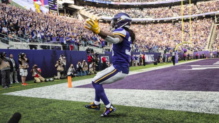 MINNEAPOLIS, MN - DECEMBER 16: Dalvin Cook #33 of the Minnesota Vikings celebrates after scoring a 13 yard touchdown in the first quarter of the game against the Miami Dolphins at U.S. Bank Stadium on December 16, 2018 in Minneapolis, Minnesota. (Photo by Adam Bettcher/Getty Images)