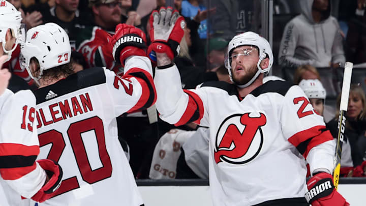 LOS ANGELES, CA - DECEMBER 6: Blake Coleman #20 and Stefan Noesen #23 of the New Jersey Devils high-five after Coleman scored an empty-net goal against the Los Angeles Kings during the third period of the game at STAPLES Center on December 6, 2018 in Los Angeles, California. (Photo by Adam Pantozzi/NHLI via Getty Images)