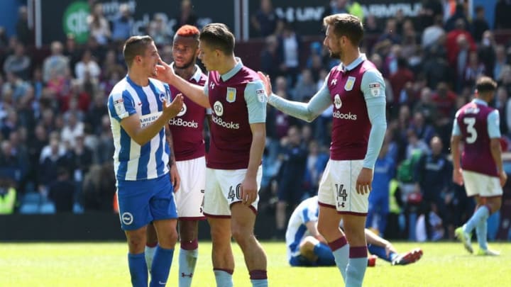 BIRMINGHAM, ENGLAND - MAY 07: Jack Grealish of Aston Villa consoles Anthony Knockaert of Brighton and Hove Albion after the Sky Bet Championship match between Aston Villa and Brighton