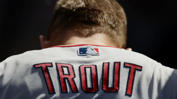 SEATTLE, WASHINGTON - MAY 02: Mike Trout #27 of the Los Angeles Angels walks in the dugout during the game against the Seattle Mariners at T-Mobile Park on May 02, 2021 in Seattle, Washington. (Photo by Steph Chambers/Getty Images)