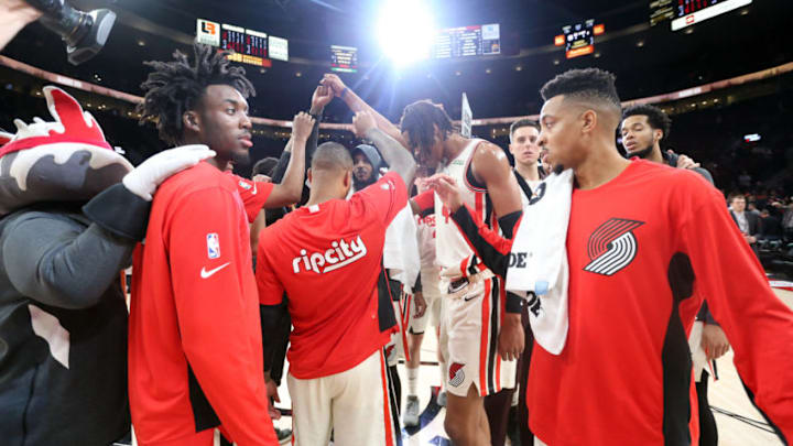 PORTLAND, OREGON - NOVEMBER 27: The Portland Trail Blazers celebrate after defeating the Oklahoma City Thunder 136-119 during their game at Moda Center on November 27, 2019 in Portland, Oregon. NOTE TO USER: User expressly acknowledges and agrees that, by downloading and or using this photograph, User is consenting to the terms and conditions of the Getty Images License Agreement (Photo by Abbie Parr/Getty Images)