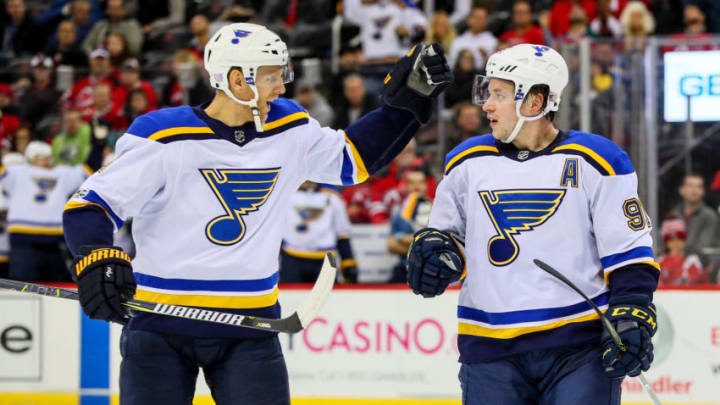 NEWARK, NJ - NOVEMBER 07: St. Louis Blues right wing Vladimir Tarasenko (91) celebrates with teammate St. Louis Blues defenseman Carl Gunnarsson (4) during the second period of the National Hockey League game between the New Jersey Devils and the St. Louis Blues on November 7, 2017 at the Prudential Center in Newark, NJ. (Photo by Rich Graessle/Icon Sportswire via Getty Images)