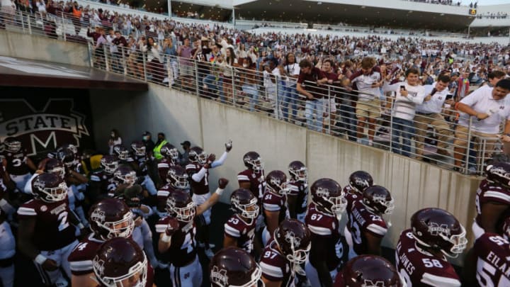 STARKVILLE, MISSISSIPPI - OCTOBER 03: Fans in the student section cheer as the Mississippi State Bulldogs take the field prior to a game against the Arkansas Razorbacks at Davis Wade Stadium on October 03, 2020 in Starkville, Mississippi. (Photo by Jonathan Bachman/Getty Images)