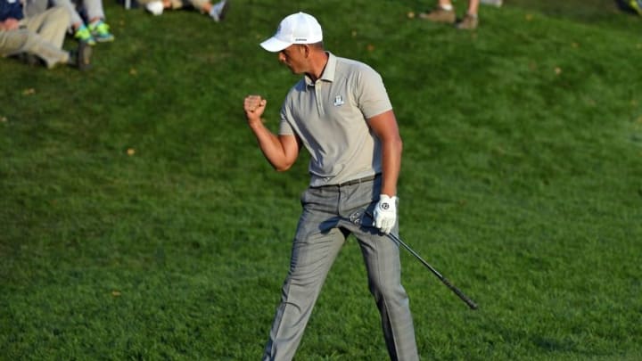 Oct 1, 2016; Chaska, MN, USA; Henrik Stenson of Sweden reacts after making an eagle on the 16th hole during the afternoon four-ball matches in the 41st Ryder Cup at Hazeltine National Golf Club. Mandatory Credit: Michael Madrid-USA TODAY Sports