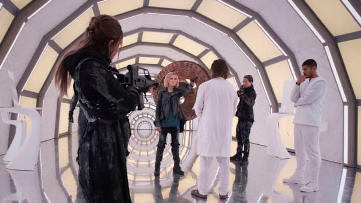 The 100 -- "A Little Sacrifice" -- Image Number: HU709B_0328r.jpg -- Pictured (L-R): Jessica Harmon as Niylah, Eliza Taylor as Clarke, John Pyper-Ferguson as Bill Cadogan, Shannon Kook as Jordan Green and Chuku Modu as Gabriel -- Photo: Dean Buscher/The CW -- 2020 The CW Network, LLC. All rights reserved.