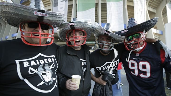 Nov 21, 2016; Mexico City, MEX; Oakland Raiders and Houston Texans fans gather outside Estadio Azteca before the international NFL Monday Night Football game. Mandatory Credit: Erich Schlegel-USA TODAY Sports
