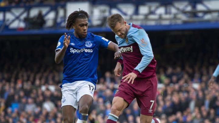 LIVERPOOL, ENGLAND - OCTOBER 19: Andriy Yarmolenko of West Ham United and Alex Iwobi of Everton in action during the Premier League match between Everton FC and West Ham United at Goodison Park on October 19, 2019 in Liverpool, United Kingdom. (Photo by Visionhaus)