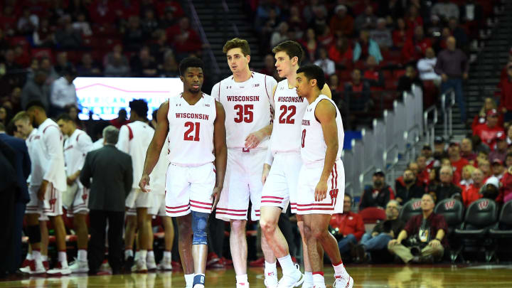 MADISON, WISCONSIN – DECEMBER 22: Khalil Iverson #21, Nate Reuvers #35, Ethan Happ #22 and D’Mitrik Trice #0 of the Wisconsin Badgers walk onto the court to start the second half against the Grambling State Tigers at Kohl Center on December 22, 2018 in Madison, Wisconsin. (Photo by Stacy Revere/Getty Images)