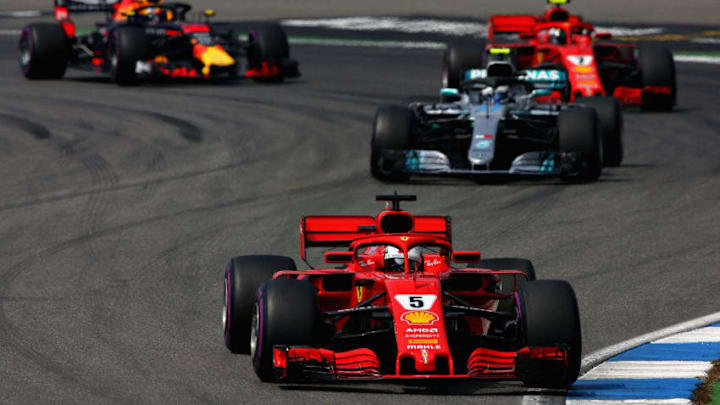 HOCKENHEIM, GERMANY - JULY 22: Sebastian Vettel of Germany driving the (5) Scuderia Ferrari SF71H leads Valtteri Bottas driving the (77) Mercedes AMG Petronas F1 Team Mercedes WO9 (Photo by Charles Coates/Getty Images)