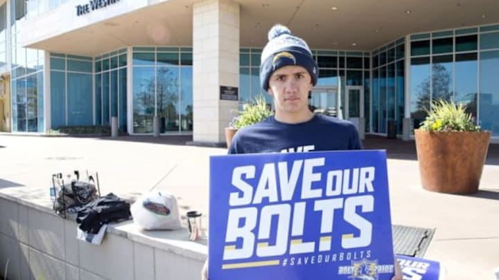Jan 12, 2016; Houston, TX, USA; San Diego Chargers fan Richard Farley holds a sign supporting his team while owners meet at the 2016 NFL Owners meeting at the Westin Houston. Mandatory Credit: Thomas B. Shea-USA TODAY Sports