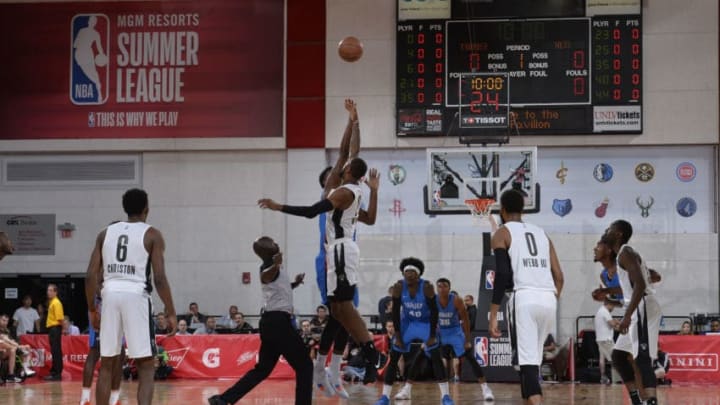 LAS VEGAS, NV - JULY 7: Tip off between PJ Dozier #35 of the Oklahoma City Thunder and Kamari Murphy #21 of the Brooklyn Nets during the 2018 Las Vegas Summer League on July 7, 2018 at the Cox Pavilion in Las Vegas, Nevada. NOTE TO USER: User expressly acknowledges and agrees that, by downloading and/or using this Photograph, user is consenting to the terms and conditions of the Getty Images License Agreement. Mandatory Copyright Notice: Copyright 2018 NBAE (Photo by David Dow/NBAE via Getty Images)