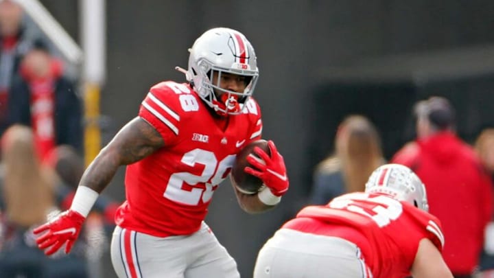 Ohio State Buckeyes running back Miyan Williams (28) runs the ball against Michigan State Spartans defense in the second quarter during their NCAA College football game at Ohio Stadium in Columbus, Ohio on November 20, 2021.Osu21msu Kwr 16