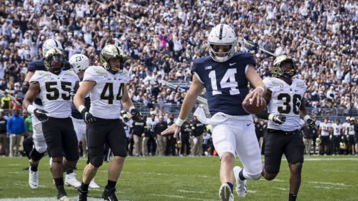 STATE COLLEGE, PA - OCTOBER 05: Sean Clifford #14 of the Penn State Nittany Lions runs for a touchdown against Purdue Boilermakers during the first half at Beaver Stadium on October 5, 2019 in State College, Pennsylvania. (Photo by Scott Taetsch/Getty Images)