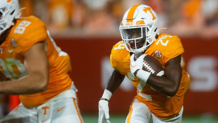 Tennessee running back Dylan Sampson (24) runs the ball during football game between Tennessee and Ball State at Neyland Stadium in Knoxville, Tenn. on Thursday, Sept. 1, 2022.Kns Utvbs0901