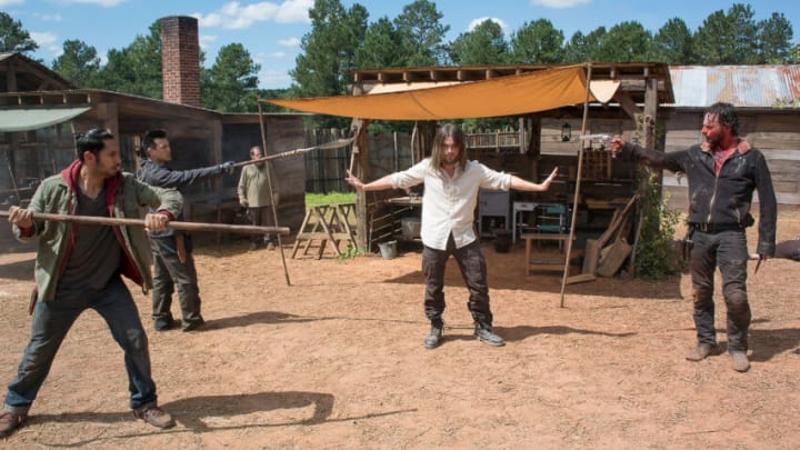 Peter Zimmerman as Eduardo, Rich Ceraulo as Guard, Tom Payne as Jesus, and Andrew Lincoln as Rick Grimes - The Walking Dead _ Season 6, Episode 11 - Photo Credit: Gene Page/AMC