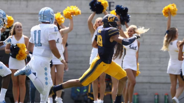 BERKELEY, CA - SEPTEMBER 01: Cameron Goode #19 of the California Golden Bears intercepts a pass by Nathan Elliott #11 of the North Carolina Tar Heels and returns it for a touchdown at California Memorial Stadium on September 1, 2018 in Berkeley, California. (Photo by Ezra Shaw/Getty Images)