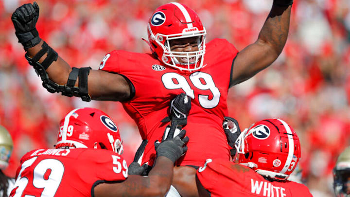 ATHENS, GA - NOVEMBER 20: Jordan Davis #99 of the Georgia Bulldogs reacts after rushing in for a touchdown during the first half against the Charleston Southern Buccaneers at Sanford Stadium on November 20, 2021 in Athens, Georgia. (Photo by Todd Kirkland/Getty Images) ATHENS, GA - NOVEMBER 20: Jordan Davis #99 of the Georgia Bulldogs reacts after rushing in for a touchdown during the first half against the Charleston Southern Buccaneers at Sanford Stadium on November 20, 2021 in Athens, Georgia. (Photo by Todd Kirkland/Getty Images)