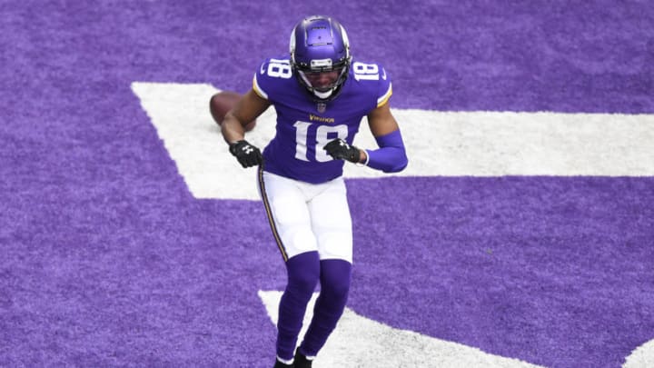 MINNEAPOLIS, MINNESOTA - NOVEMBER 29: Justin Jefferson #18 of the Minnesota Vikings celebrates scoring a touchdown during the first quarter against the Carolina Panthers at U.S. Bank Stadium on November 29, 2020 in Minneapolis, Minnesota. (Photo by Hannah Foslien/Getty Images)
