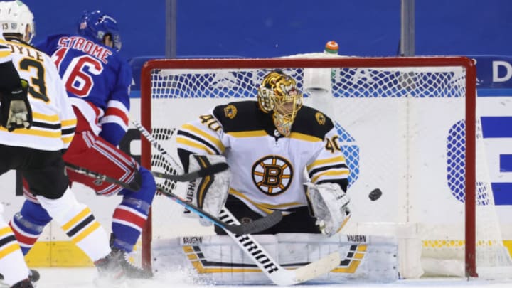 NEW YORK, NEW YORK - FEBRUARY 10: Tuukka Rask #40 of the Boston Bruins makes the stop on Ryan Strome #16 of the New York Rangers at Madison Square Garden on February 10, 2021 in New York City. The Bruins defeated the Rangers 3-2 in overtime. (Photo by Bruce Bennett/Getty Images)