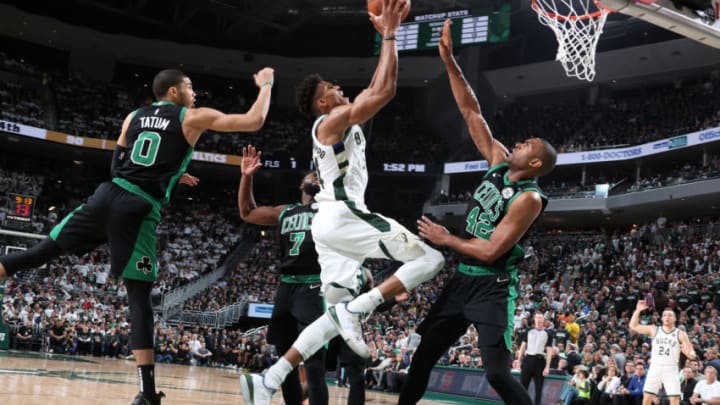 MILWAUKEE, WI - APRIL 28: Giannis Antetokounmpo #34 of the Milwaukee Bucks drives to the basket against the Boston Celtics during Game One of the Eastern Conference Semi-Finals of the 2019 NBA Playoffs on April 28, 2019 at the Fiserv Forum Center in Milwaukee, Wisconsin. NOTE TO USER: User expressly acknowledges and agrees that, by downloading and or using this Photograph, user is consenting to the terms and conditions of the Getty Images License Agreement. Mandatory Copyright Notice: Copyright 2019 NBAE (Photo by Nathaniel S. Butler/NBAE via Getty Images).