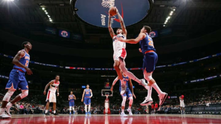 WASHINGTON, DC – OCTOBER 6: Kelly Oubre Jr. #12 of the Washington Wizards shoots the ball against the New York Knicks during the preseason game on October 6, 2017 at Capital One Arena in Washington, DC. NOTE TO USER: User expressly acknowledges and agrees that, by downloading and or using this Photograph, user is consenting to the terms and conditions of the Getty Images License Agreement. Mandatory Copyright Notice: Copyright 2017 NBAE (Photo by Ned Dishman/NBAE via Getty Images)