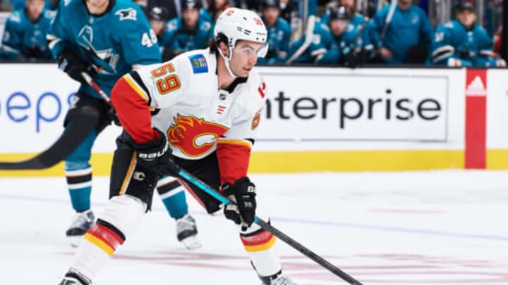 SAN JOSE, CA – SEPTEMBER 27: Calgary Flames center Dillon Dube (59) carries the puck during the San Jose Sharks game versus the Calgary Flames on September 27, 2018, at SAP Center at San Jose in San Jose, CA. (Photo by Matt Cohen/Icon Sportswire via Getty Images)