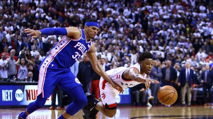 Kyle Lowry #7 of the Toronto Raptors dives for the ball as Tobias Harris #33 of the Philadelphia 76ers defends during Game Two of the second round of the 2019 NBA Playoffs. (Photo by Vaughn Ridley/Getty Images)