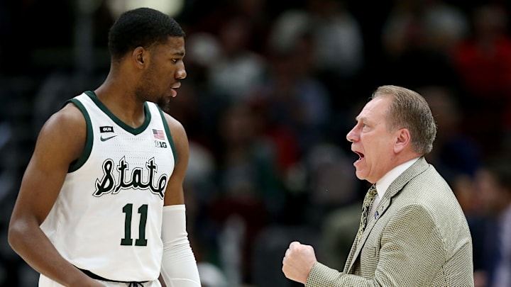 CHICAGO, ILLINOIS – MARCH 15: Head coach Tom Izzo of the Michigan State Spartans meets with Aaron Henry #11 in the first half against the Ohio State Buckeyes during the quarterfinals of the Big Ten Basketball Tournament at the United Center on March 15, 2019 in Chicago, Illinois. (Photo by Dylan Buell/Getty Images)