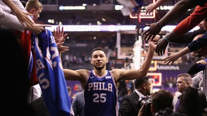 PHOENIX, AZ - DECEMBER 31: Ben Simmons #25 of the Philadelphia 76ers high fives fans following the NBA game against the Phoenix Suns at Talking Stick Resort Arena on December 31, 2017 in Phoenix, Arizona. The 76ers defeated the Suns 123-110. (Photo by Christian Petersen/Getty Images)