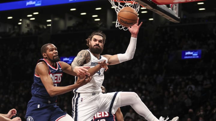 cJan 3, 2022; Brooklyn, New York, USA; Brooklyn Nets forward Kevin Durant (7) and Memphis Grizzlies center Steven Adams (4) fight for loose ball in the third quarter at Barclays Center. Mandatory Credit: Wendell Cruz-USA TODAY Sports